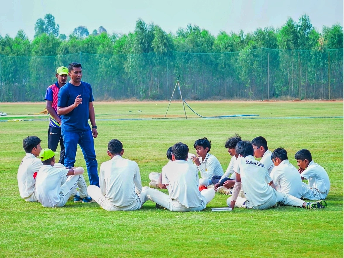 coach instructing students